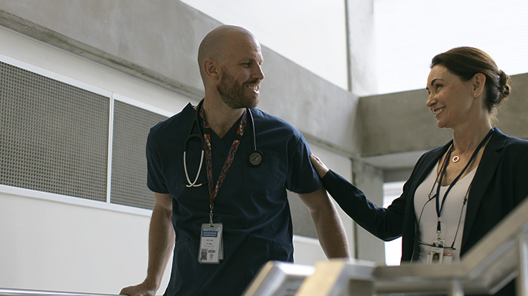 Dr Declan Scragg and colleague in hospital stairwell