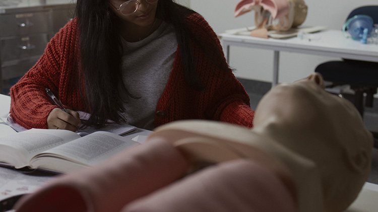 Medical Student studying in lab