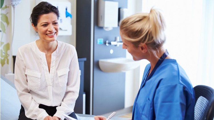 Female patient with doctor