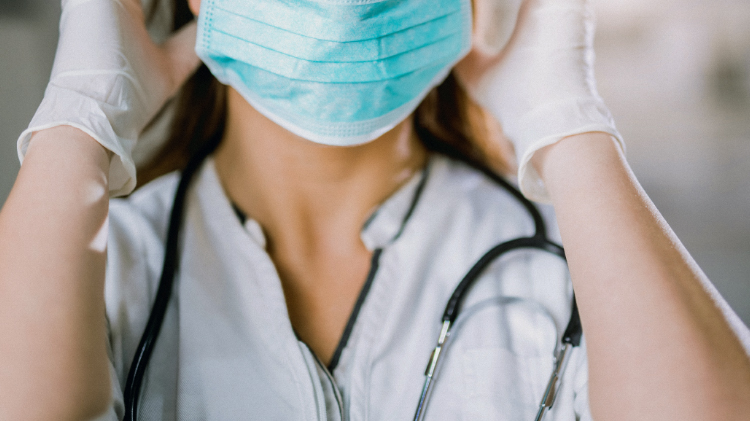 Health worker in mask