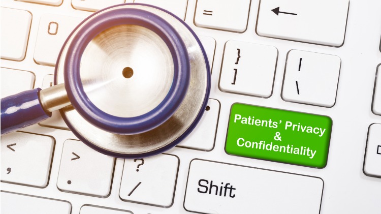 Stethoscope on keyboard showing a privacy and confidentiality key