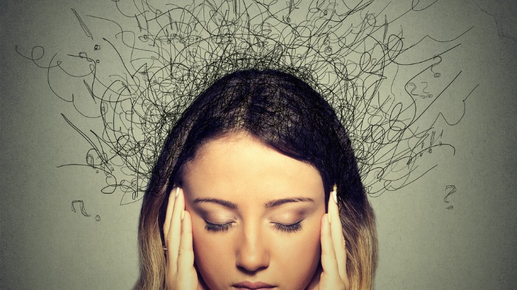 Woman with thoughts swirling